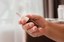 close-up-hand-holding-nasal-spray.jpg